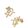New Diamantøredobber gullblomster 0,60 ct Ørepynt