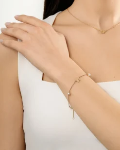 Hot Gullarmbånd med sommerfugl-dekor og perler Armbånd
